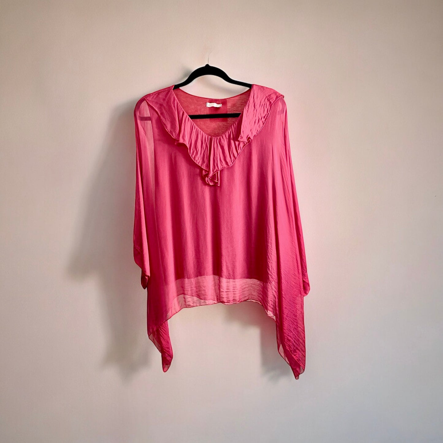 Blusa de seda con vuelo