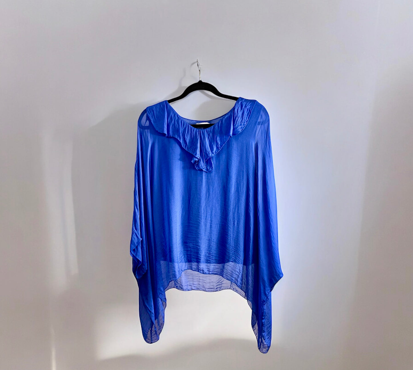 Blusa de seda con vuelo